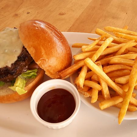 Zenith Hotel Kuantan Exterior photo A cheeseburger and French fries