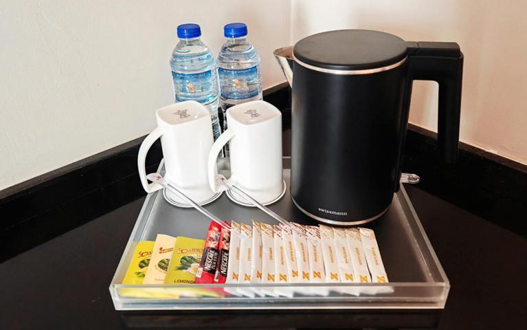 Zenith Hotel Kuantan Exterior photo A kettle and tea bags in a hotel room