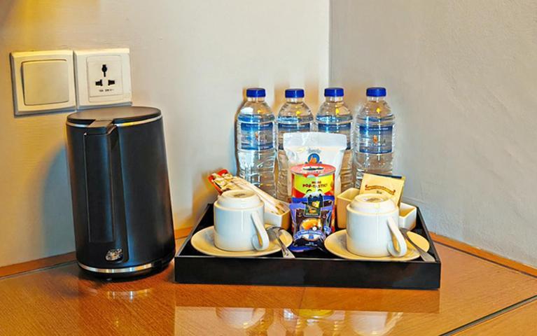 Zenith Hotel Kuantan Exterior photo A kettle and bottled water in a hotel room
